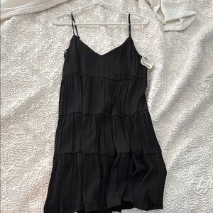 The Impeccable Pig Black Spaghetti Strap Mini Dress